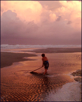 Boy with skimboard
